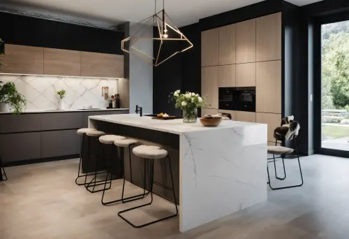 Pale oak tall units beside a built-in oven, with a white marble island under a brass pendant frame